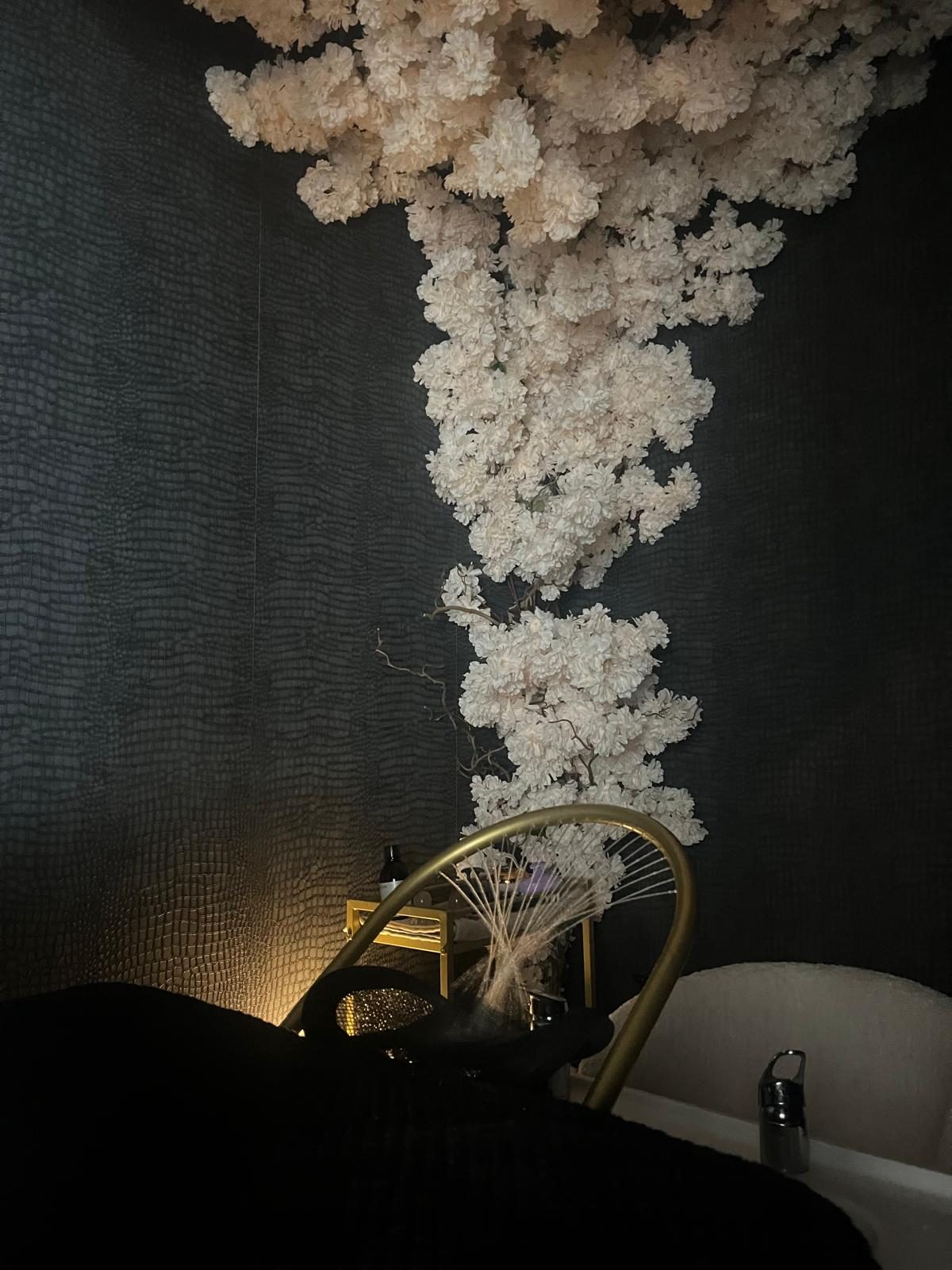 Blossom feature wall in a KL Beauty Clinic treatment suite